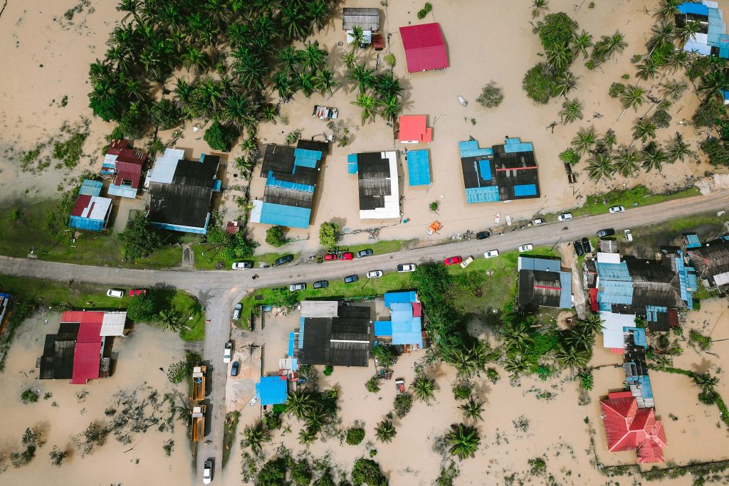 pexels-photo-14823614-14823614 Aerial shot showing flooded houses in Kijal, Terengganu, Malaysia, highlighting the impact of natural disasters.